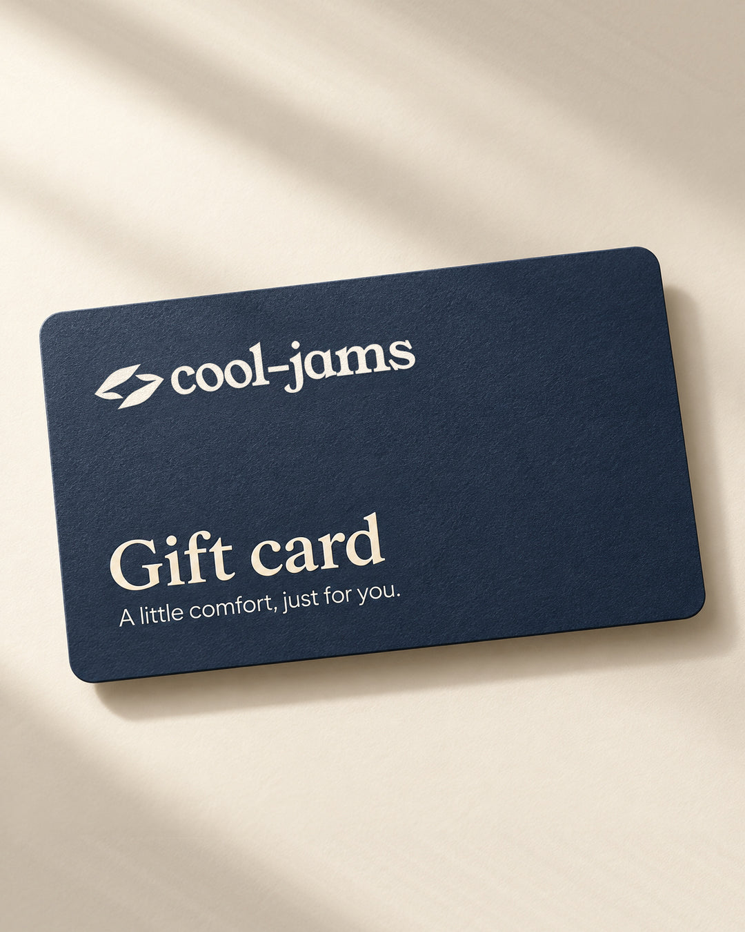 Cool-jams e-gift card, a navy card printed with the Cool-jams logo and the words Gift card, A little comfort, just for you