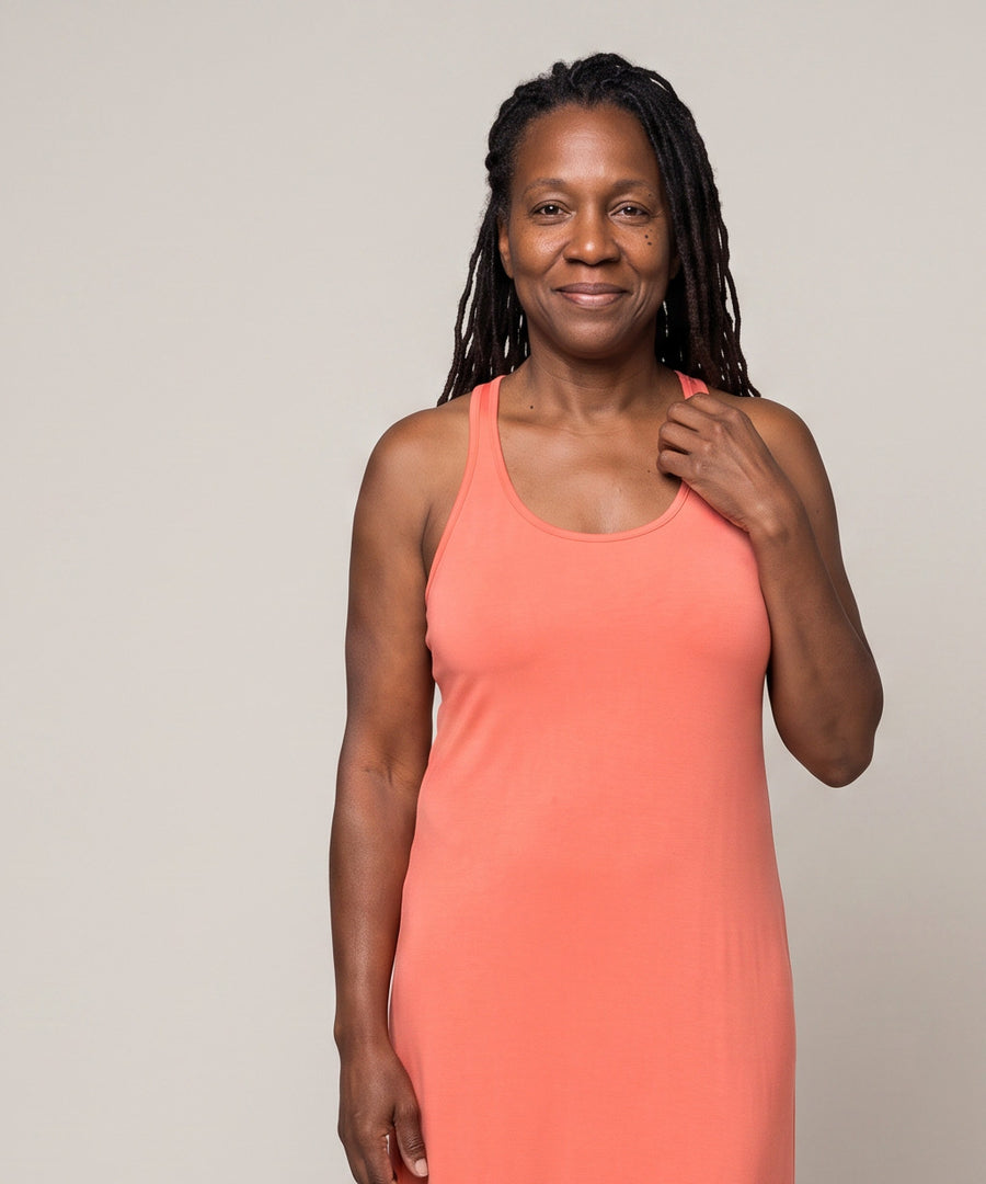 Woman in the coral Women's DayBasics Long Racerback Tank Gown with Built-In Shelf Bra