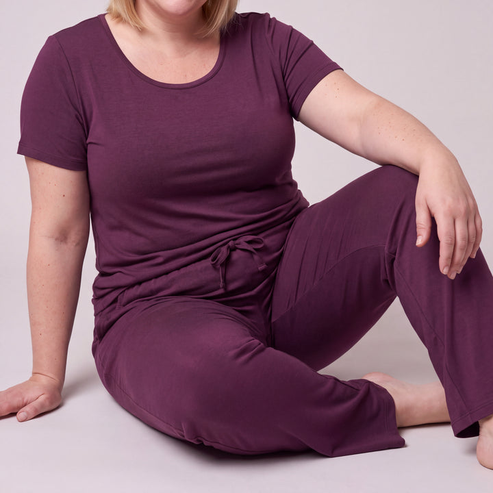 Merlot Cool-jams NightCool Pants for women, close-up, seated with one knee up