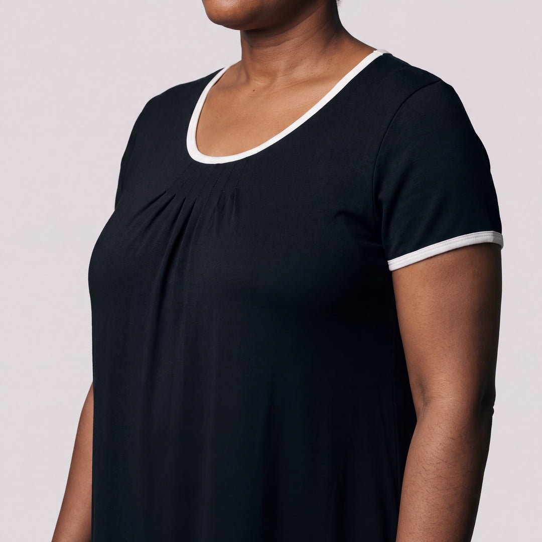 Black Cool-jams NightCool Pleated Front Short Sleeve Nightie for women, short sleeves, soft pleated front and white trim at the neckline and sleeves, close-up of the neckline, front pleats and sleeve trim