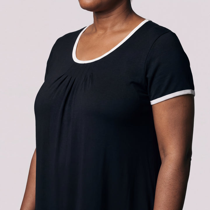 Black Cool-jams NightCool Pleated Front Short Sleeve Nightie for women, short sleeves, soft pleated front and white trim at the neckline and sleeves, close-up of the neckline, front pleats and sleeve trim