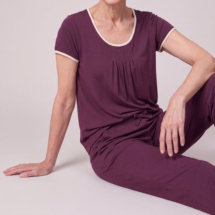 Merlot Cool-jams NightCool Pleated T-Shirt for women, close-up, seated with legs long, the full pants