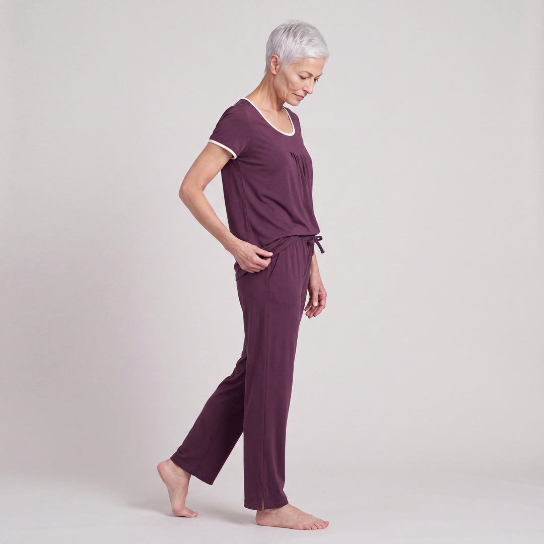 Merlot Cool-jams NightCool Pleated T-Shirt for women with cream binding, worn with matching drawstring pants, side view, full length