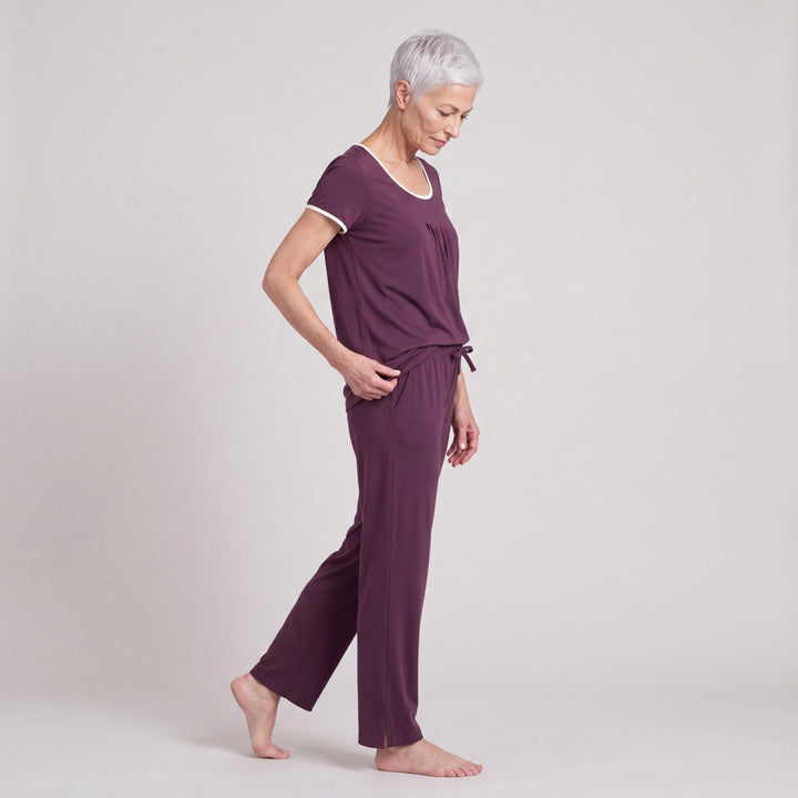 Merlot Cool-jams NightCool Pleated T-Shirt for women with cream binding, worn with matching drawstring pants, side view, full length