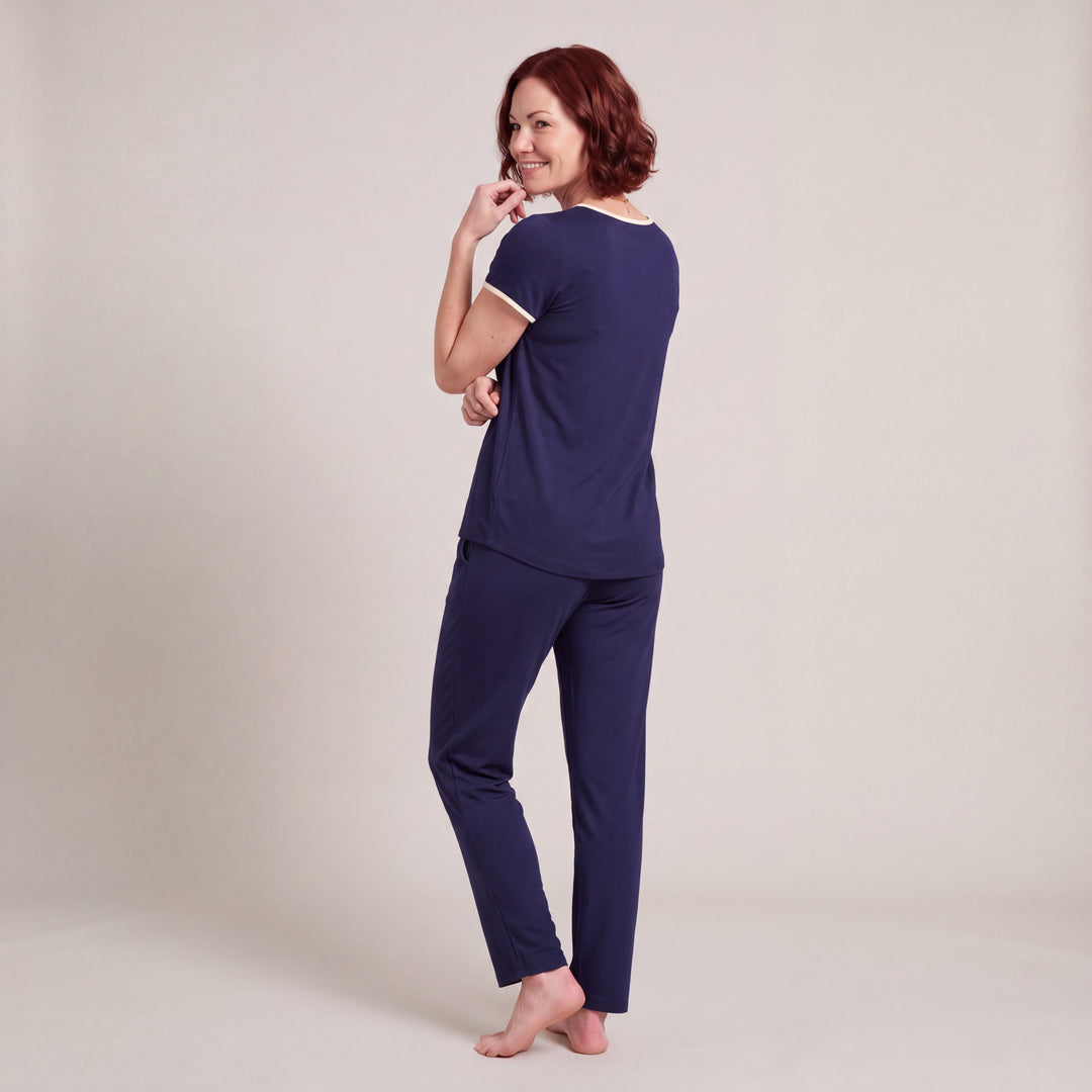Navy Cool-jams NightCool Pleated T-Shirt for women with cream binding, worn with matching drawstring pants, back view, full length