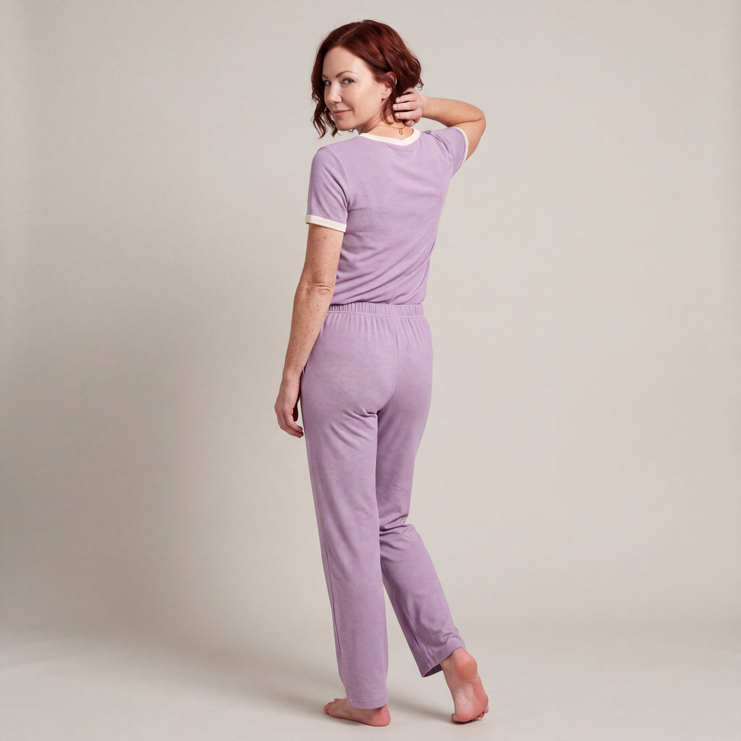 Violet Cool-jams NightCool Pleated T-Shirt for women with cream binding, worn with matching drawstring pants, back view, full length