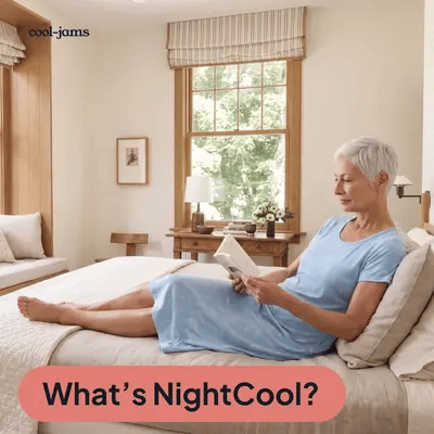 Woman in the Island Leaf Women's NightCool Scoop Neck Nightshirt in bed, with NightCool fabric pulling a drop of sweat off skin