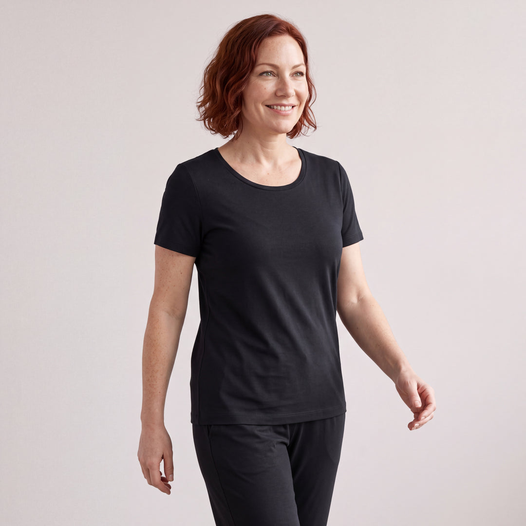 Black Cool-jams NightCool Scoop T-Shirt for women, worn with matching pants, model walking