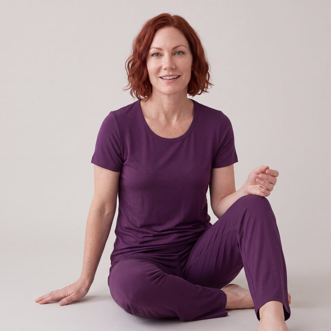 Merlot Cool-jams NightCool Scoop T-Shirt for women, worn with matching pants, model seated on the floor