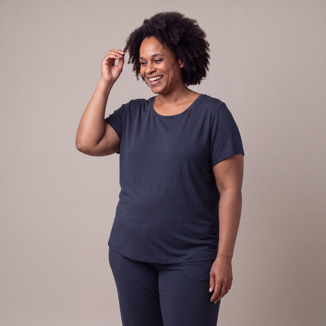 Navy Cool-jams NightCool Scoop T-Shirt for women, worn with matching pants, model smiling with a hand in her hair