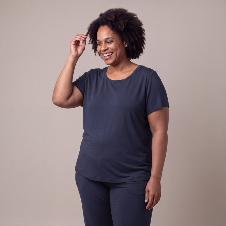 Navy Cool-jams NightCool Scoop T-Shirt for women, worn with matching pants, model smiling with a hand in her hair
