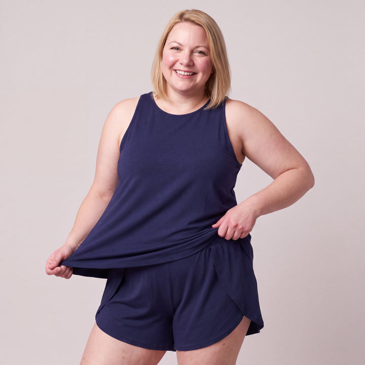 Navy Cool-jams NightCool Tulip Tank Top for women, worn with matching Tulip Shorts, close-up from head to hips