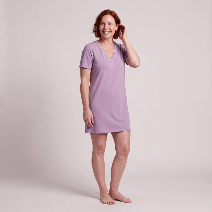 Violet Cool-jams NightCool V-Neck Nightshirt for women, contrast piping at the V neckline, model with a hand in her hair, full length