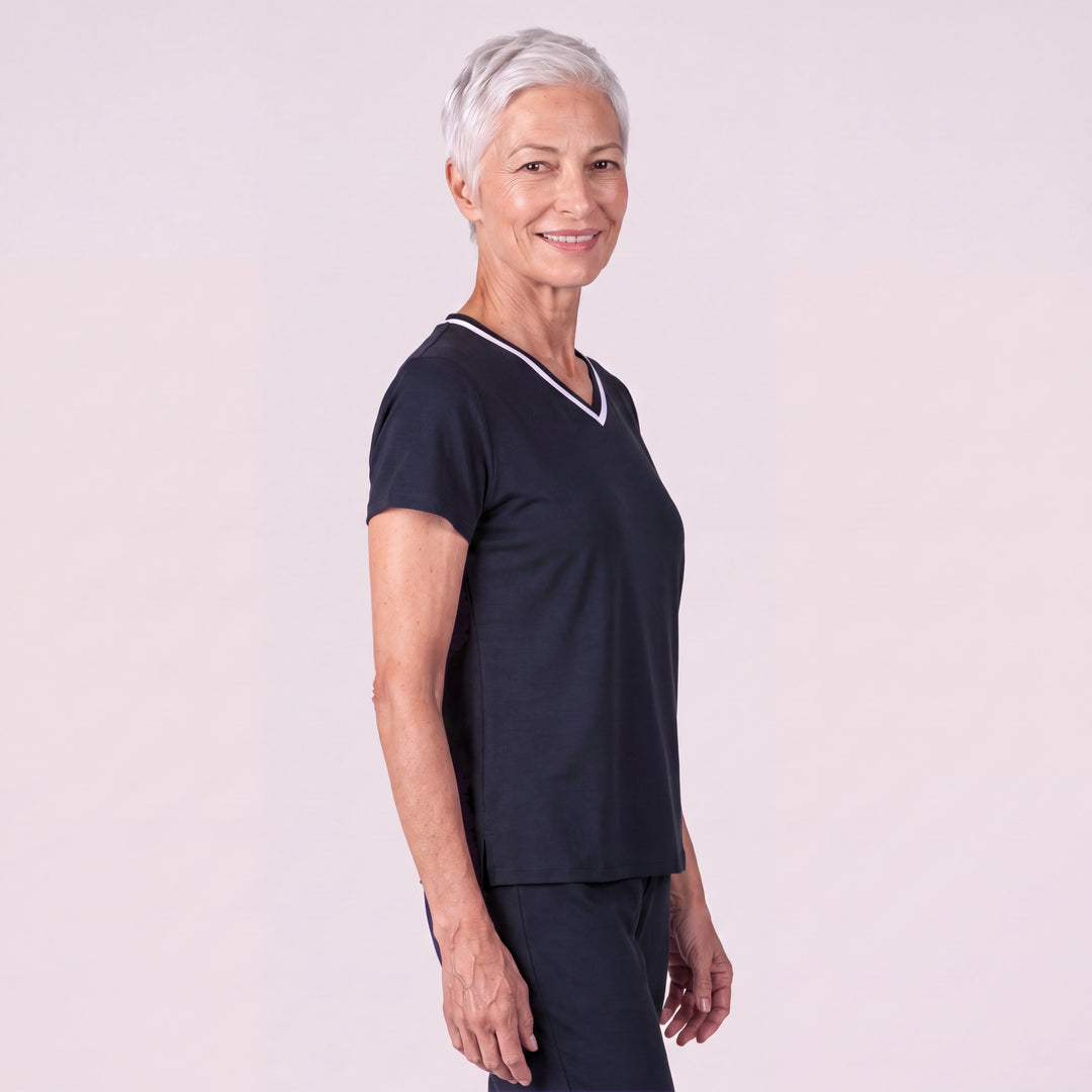 Navy Cool-jams Women's NightCool V-Neck Top, three-quarter view on a greige backdrop, short sleeves and a white-trimmed V-neck, worn with matching pants sold separately, breathable sleepwear for warm nights